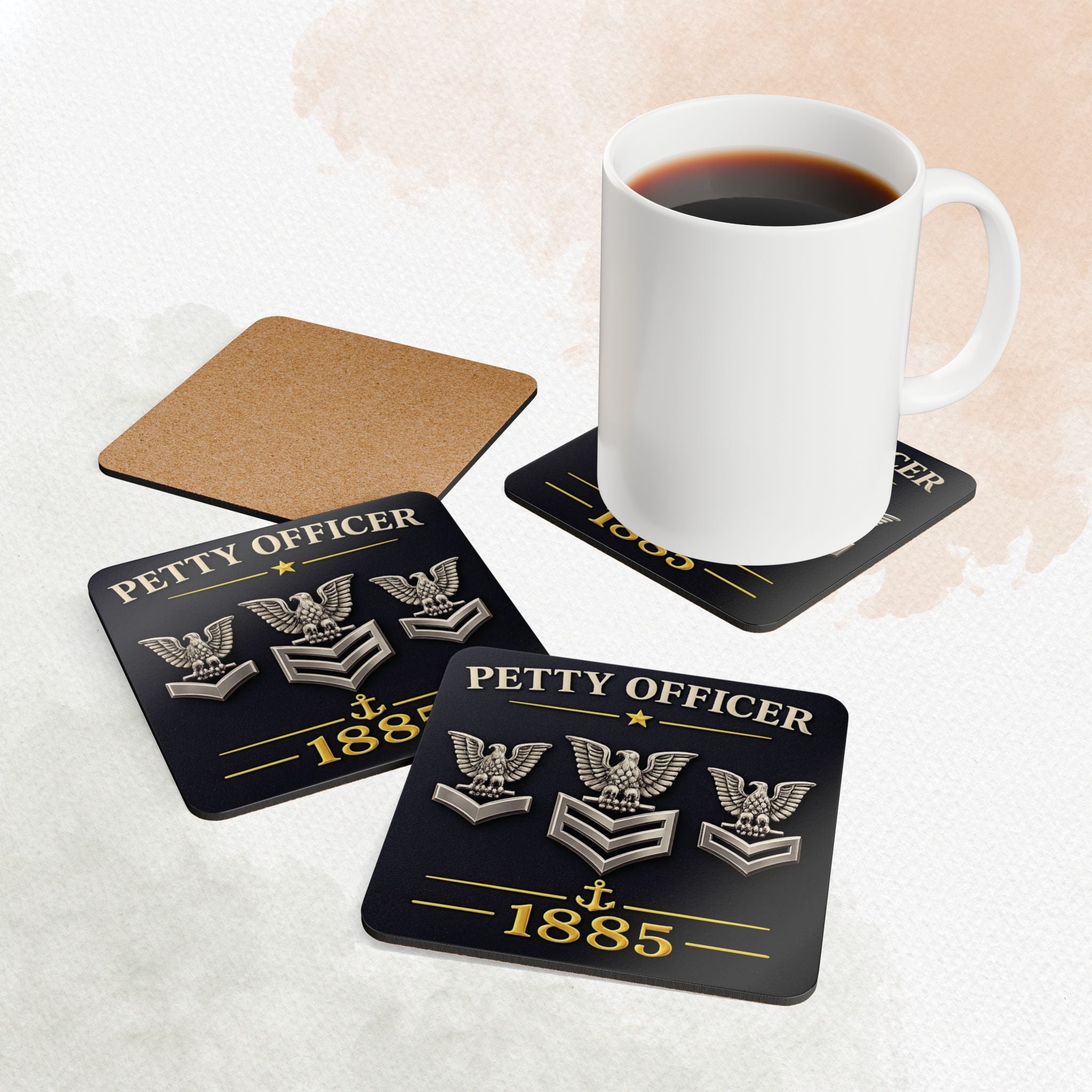Coasters with 'Petty Officer 1885' design on a white surface with a mug of coffee.