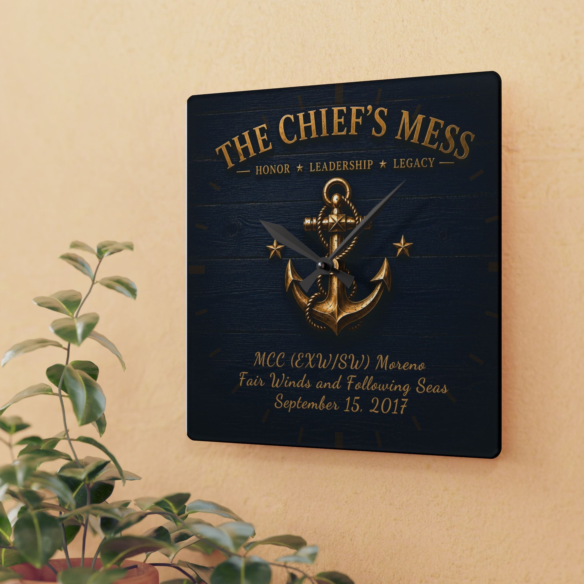 Decorative wall plaque with anchor design and text on a beige wall.