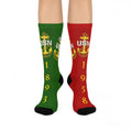 Green and red socks with USN logo and numbers on a white background