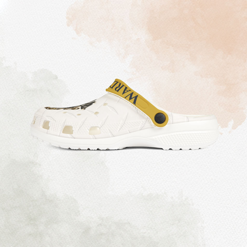 White clog shoe with yellow strap on a white background