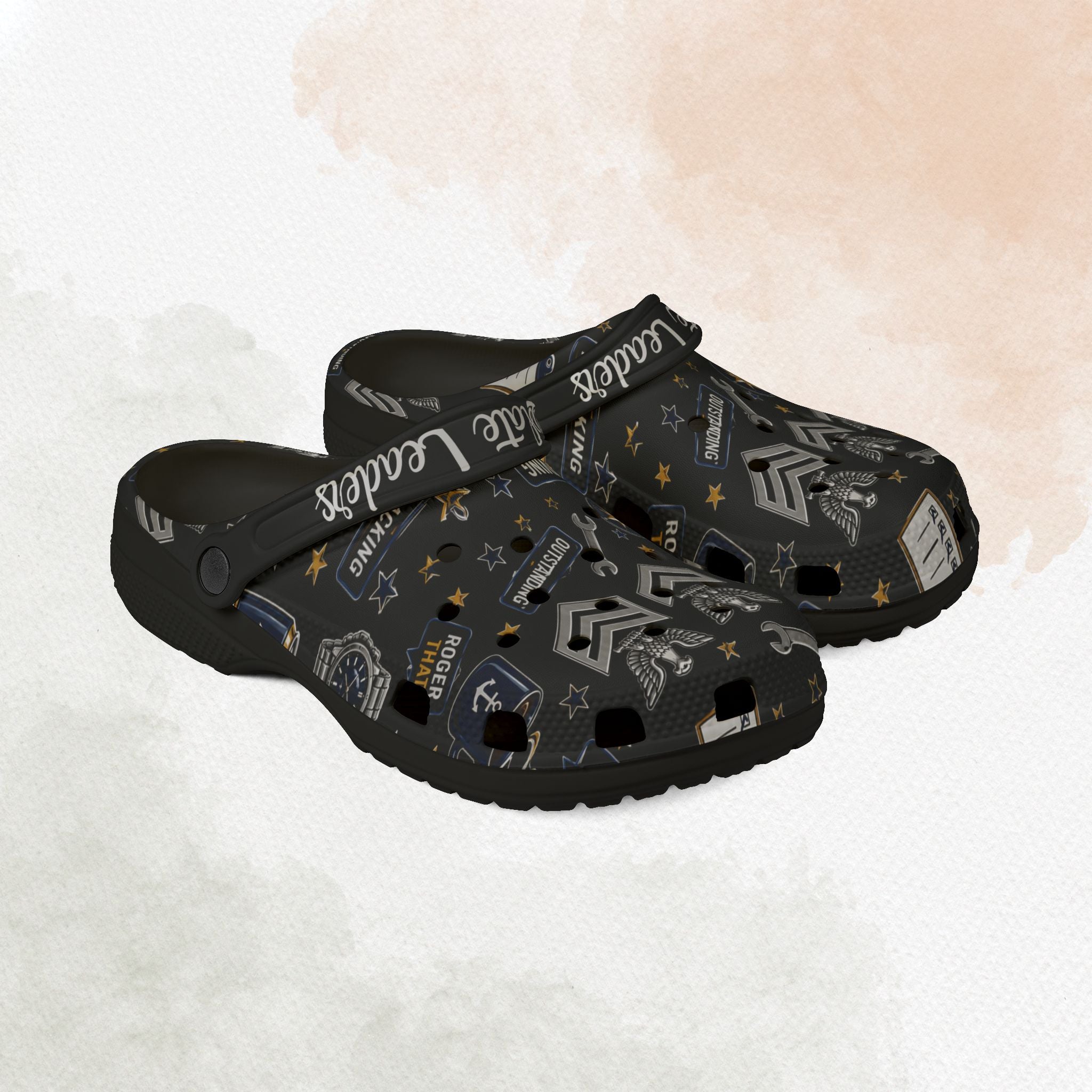 Black clogs with graphic design on a light background