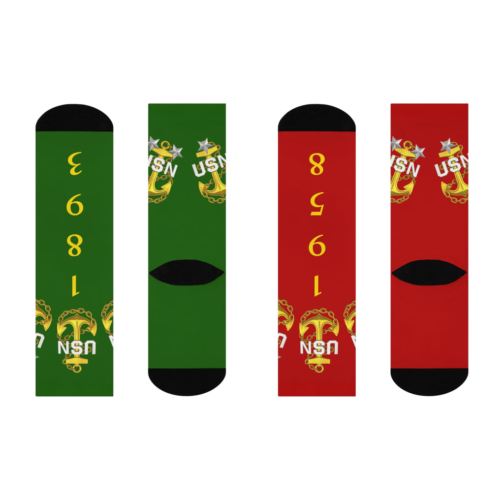 Two pairs of socks, one green and one red, with a logo and numbers on a white background.