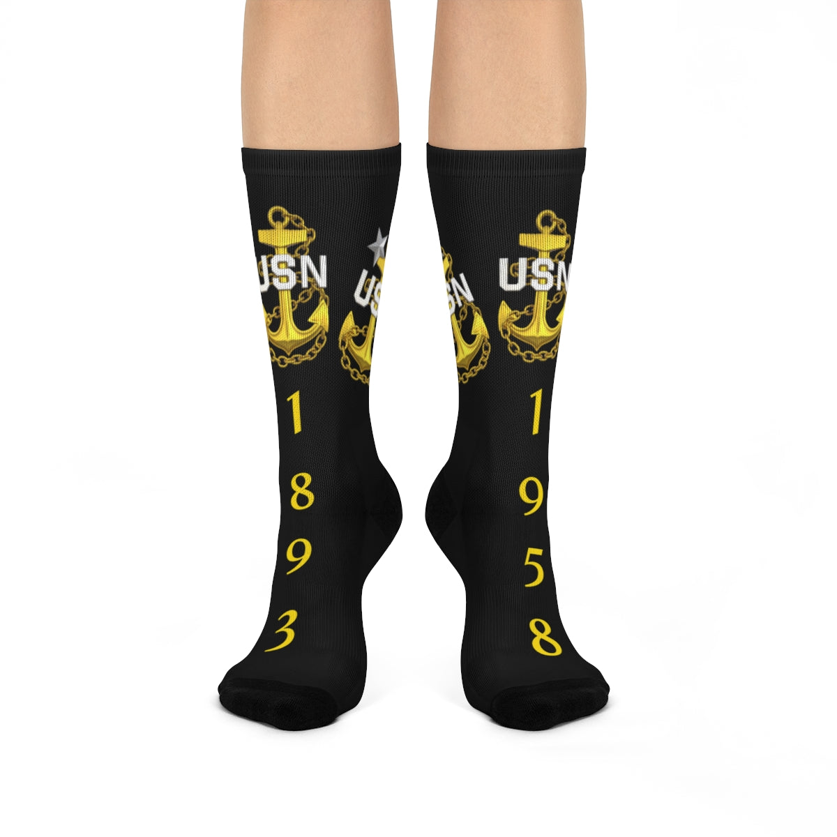 Black socks with USN anchor design on a white background