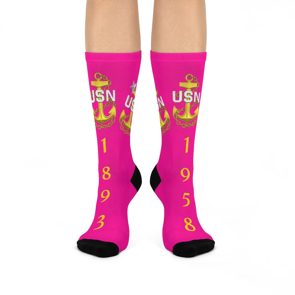 Pink socks with USN anchor logo and numbers on a white background