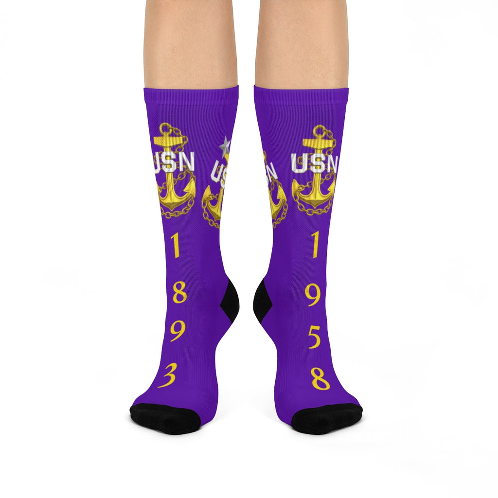 Purple socks with USN anchor logo and numbers on a white background