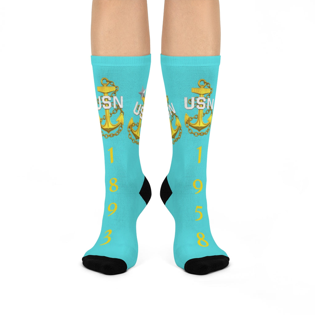 Turquoise socks with USN logo and numbers on a white background