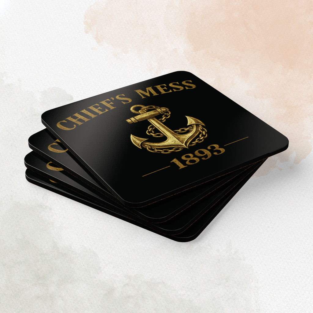 Set of black coasters with gold 'Chief's Mess 1893' design on a white surface.
