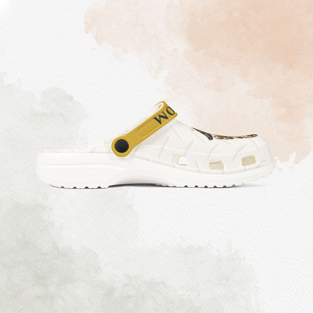 White sandal with a yellow strap on a white background