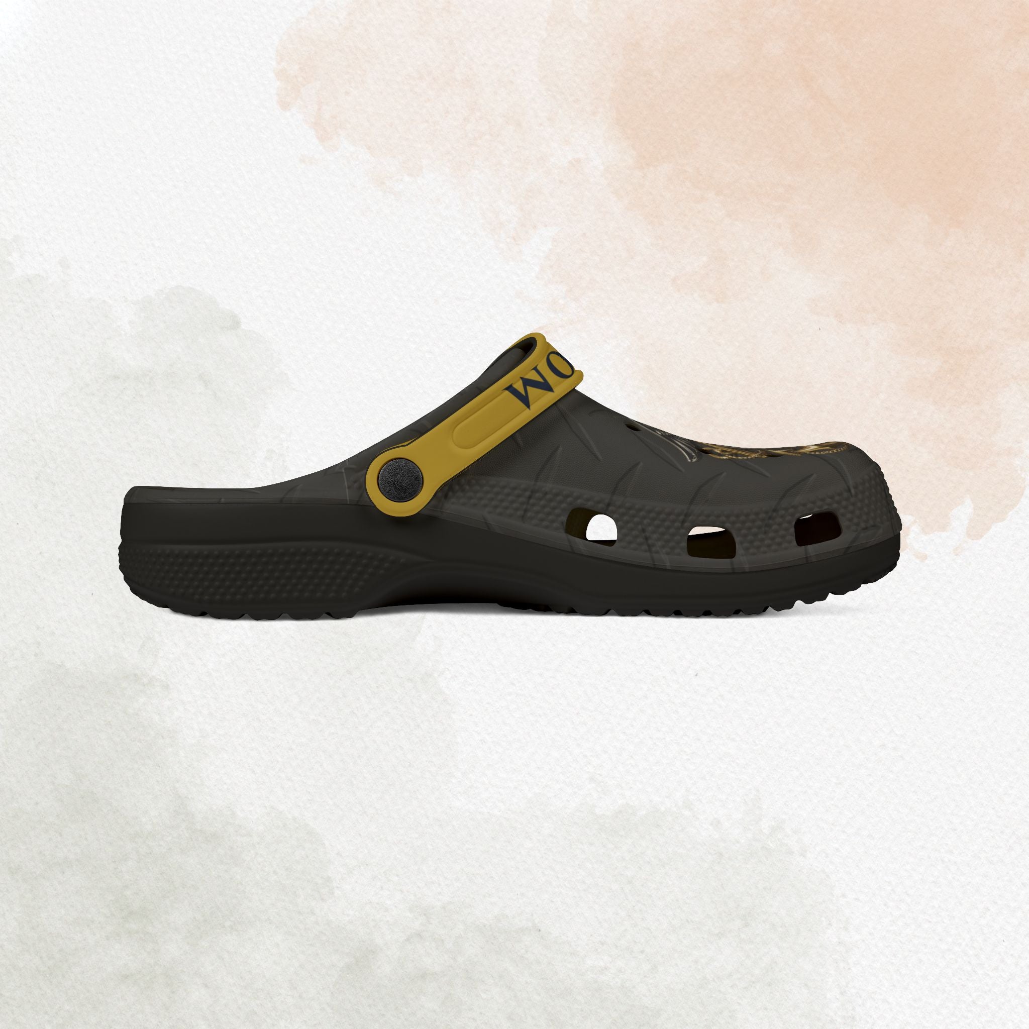 Black clog shoe with yellow strap on a textured white background