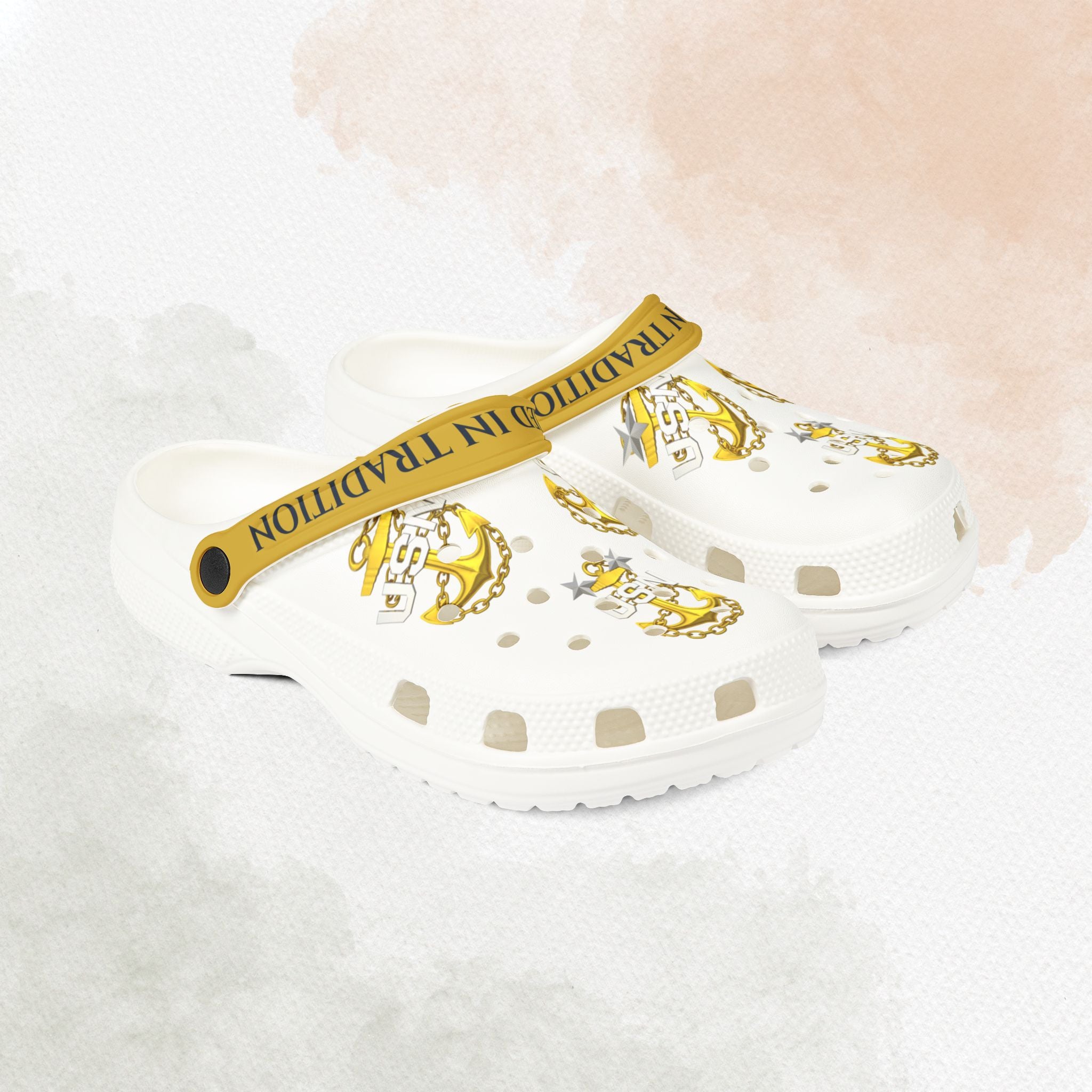 White clogs with gold accents on a white background