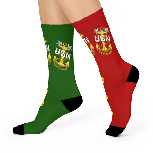 Green and red socks with USN logo on a white background
