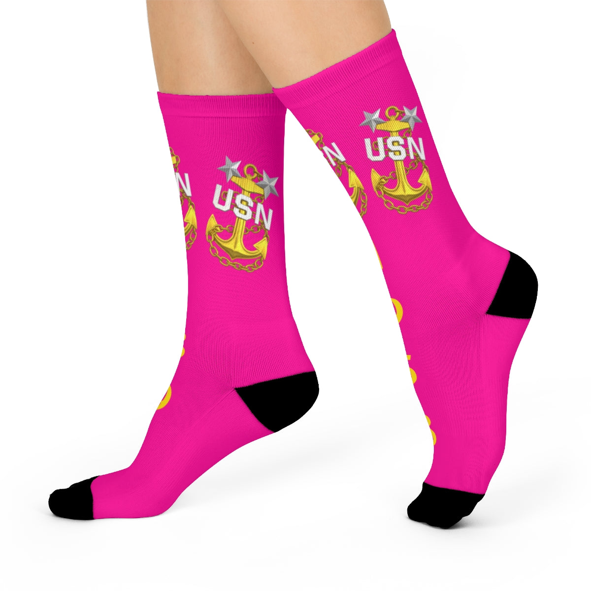 Pink socks with USN logo on a white background